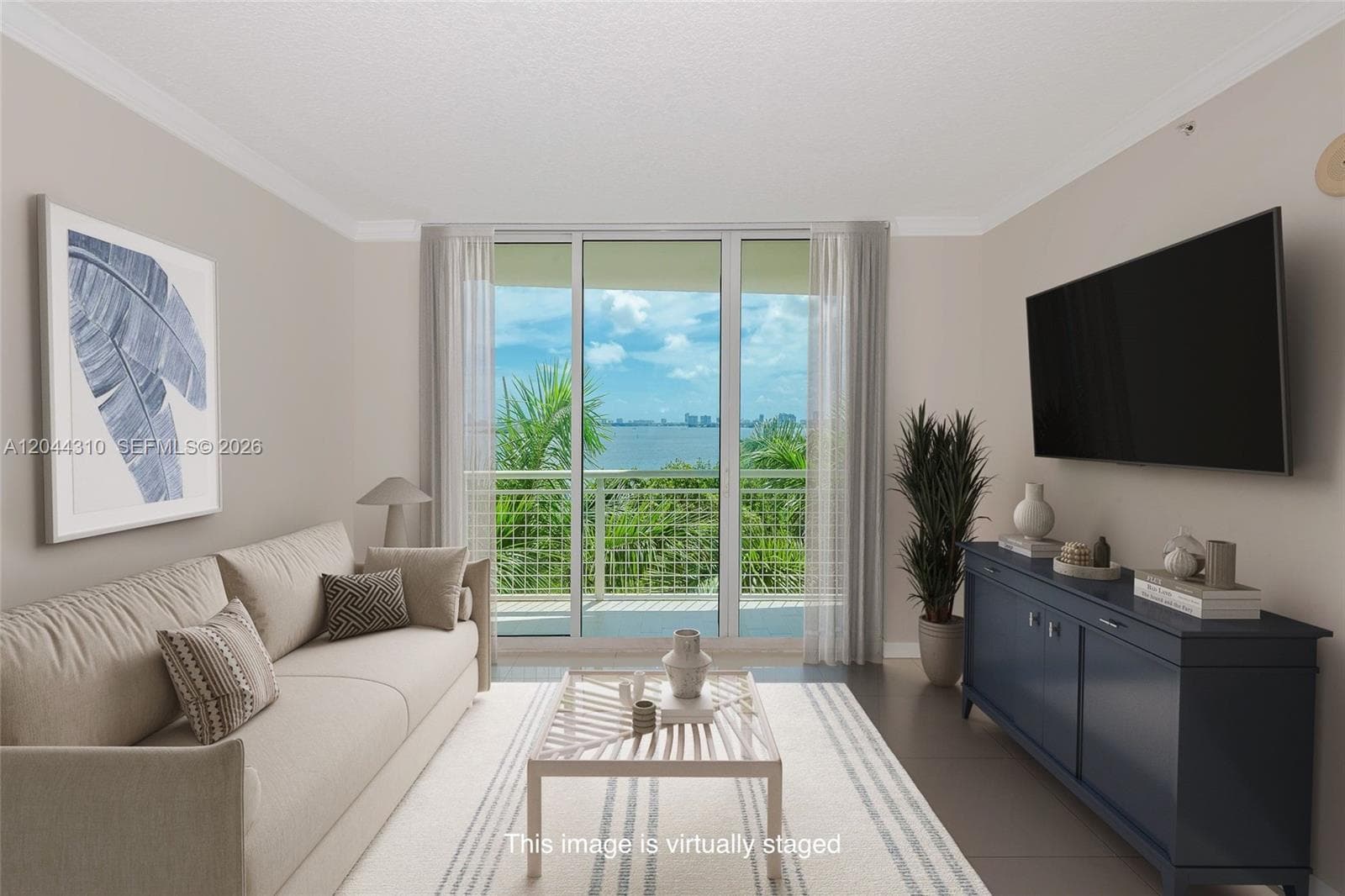 with balcony & direct bay views!